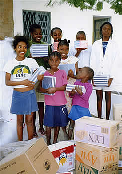 Children receiving school supplies